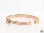 Rose gold plated bracelet with cz, inscribed alphabets and twin disc motif