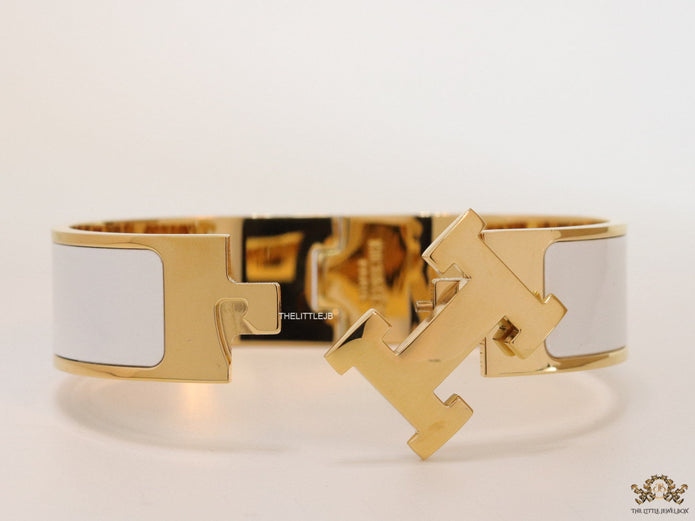 Openable H motif white 18mm bracelet in a shiny gold plating