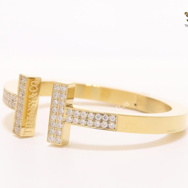 Alphabet T cz and gold bracelet