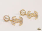 Dainty cz and pearl earrings with double C