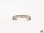 Twin G motif malachite green bracelet in matt gold finish