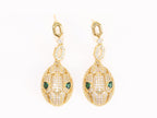 Gold Snake head pendant set with emerald detailing