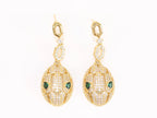 Gold Snake head pendant set with emerald detailing