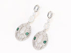 Platinum Snake head pendant set with emerald detailing