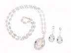 Platinum Snake head pendant set with emerald detailing