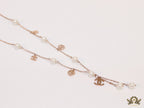 Gold chain necklace with pearls and alphabet motifs