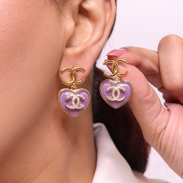 Double C on dangling purple heart gold earrings with CZ