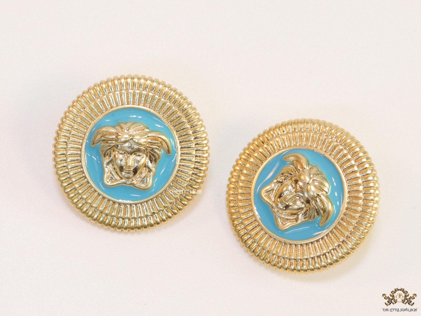 Blue and golden round Medusa stud earrings