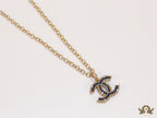 Gold plated link chain necklace with multi colored cz pendant
