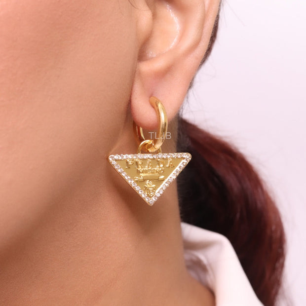 Gold Dangling Triangle earrings on small hoops with CZ