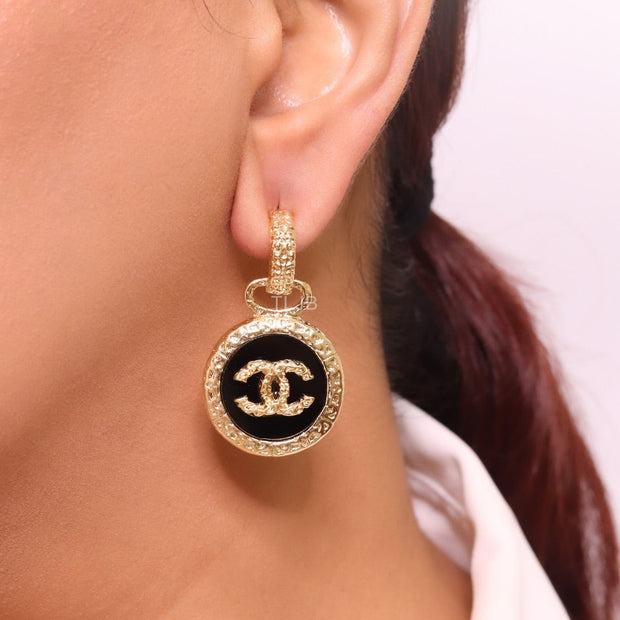 Double C on black enamel hanging gold earrings with CZ
