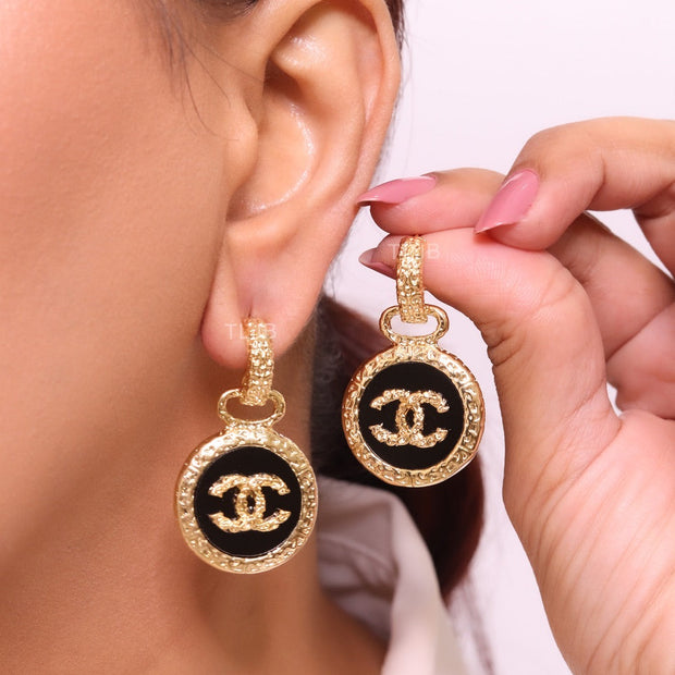Double C on black enamel hanging gold earrings with CZ