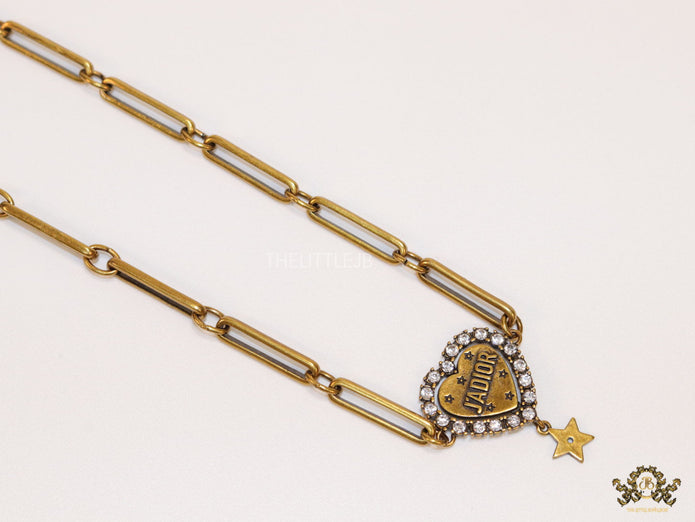 Gold plated link chain necklace with heart shaped alphabet pendant