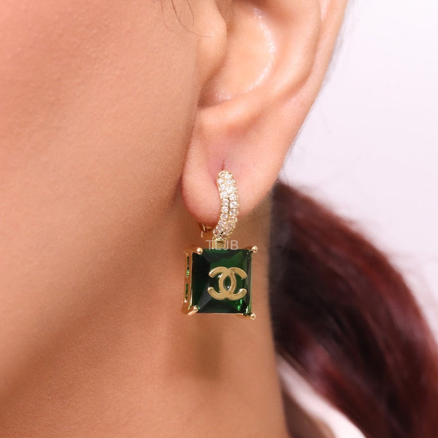 Double C on dangling green square gold earrings with CZ