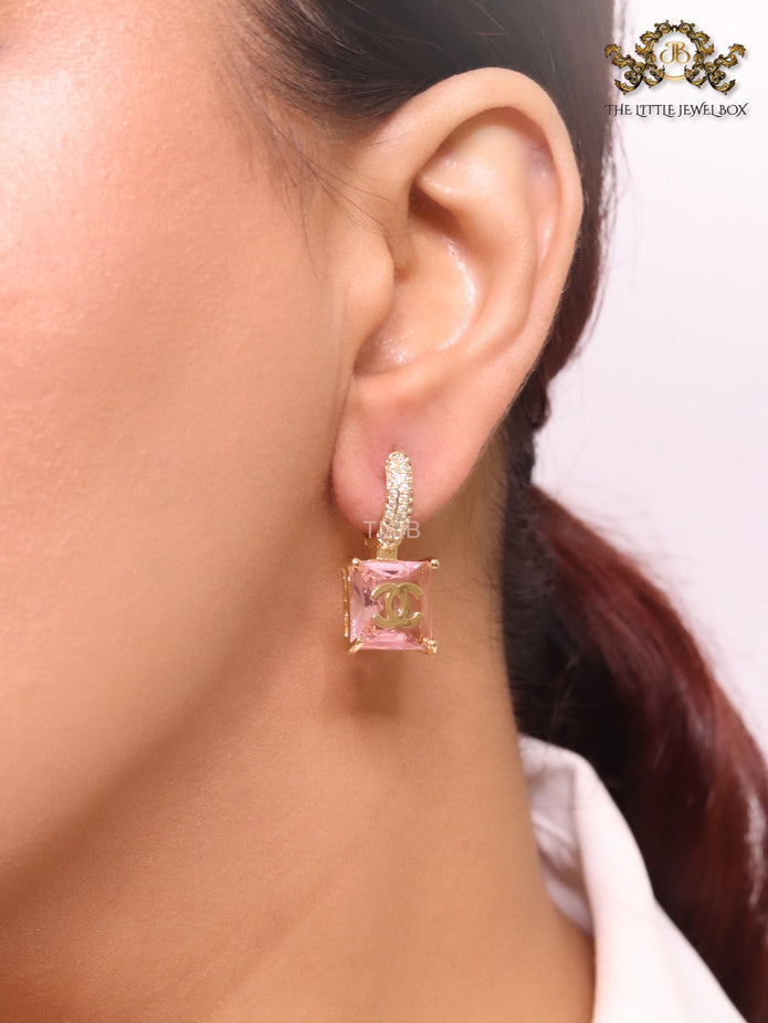 Double C on dangling pink square gold earrings with CZ
