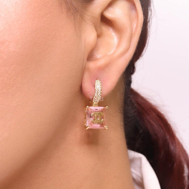 Double C on dangling pink square gold earrings with CZ