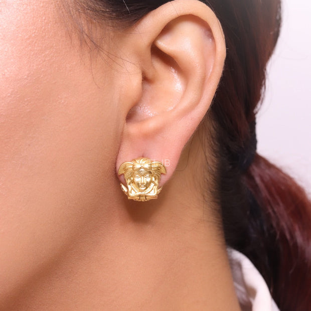 Reversible gold medusa studs with cz