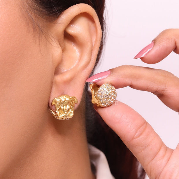 Reversible gold medusa studs with cz