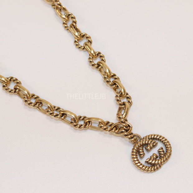 Fancy link chain golden necklace with alphabet pendant