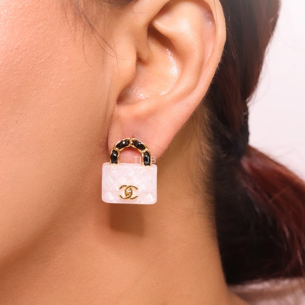 Black and white Double C purse earrings in gold