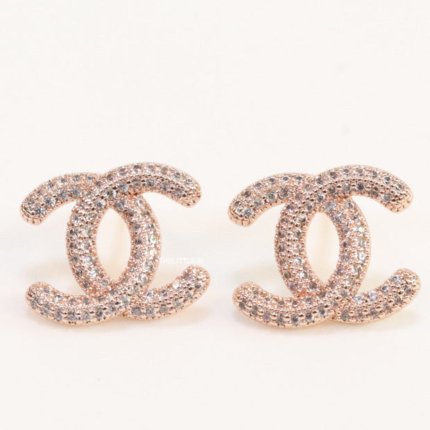 Rose gold plated twin C motif studs with cz