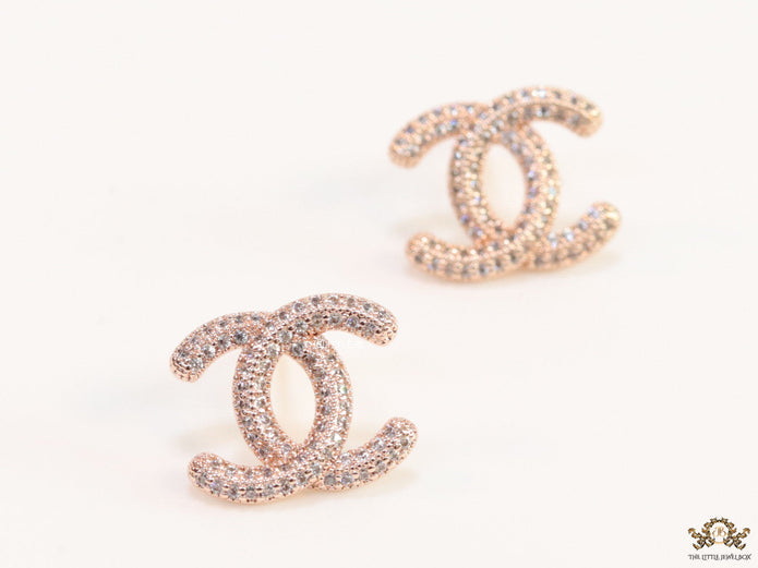 Rose gold plated twin C motif studs with cz