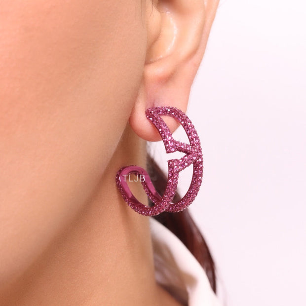Pink curved open alphabet V hoops