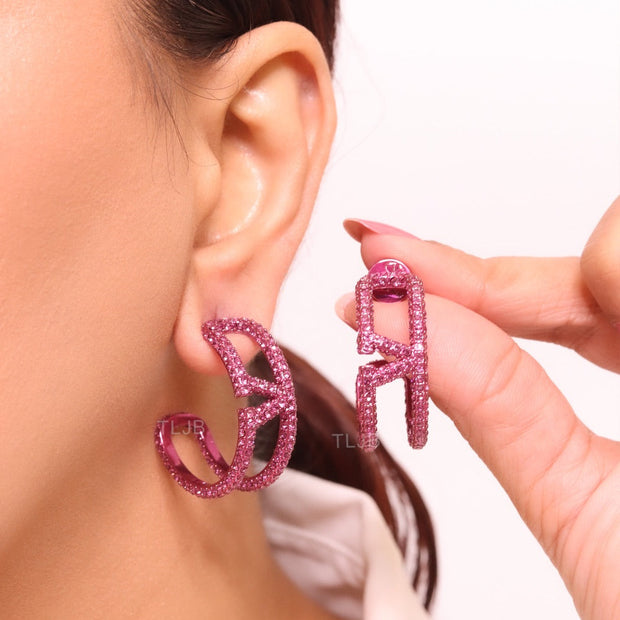 Pink curved open alphabet V hoops