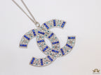 Platinum chain alphabet necklace with coloured cz