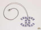 Platinum chain alphabet necklace with coloured cz
