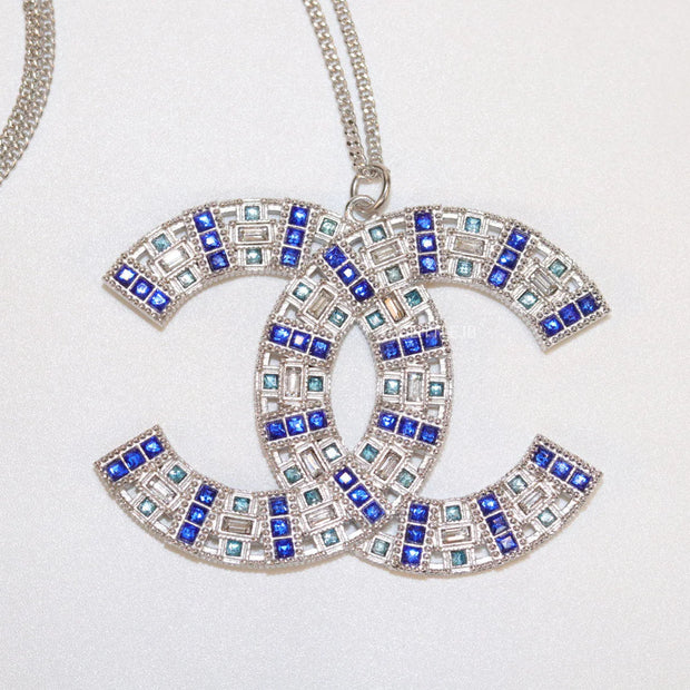 Platinum chain alphabet necklace with coloured cz