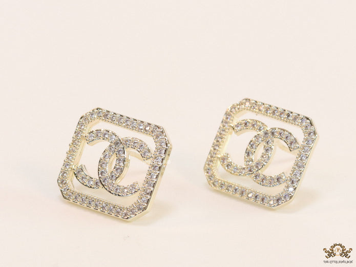 Gold plated square cz stud with twin C motif