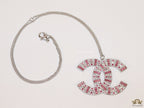 Platinum chain alphabet necklace with coloured cz