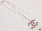 Platinum chain alphabet necklace with coloured cz