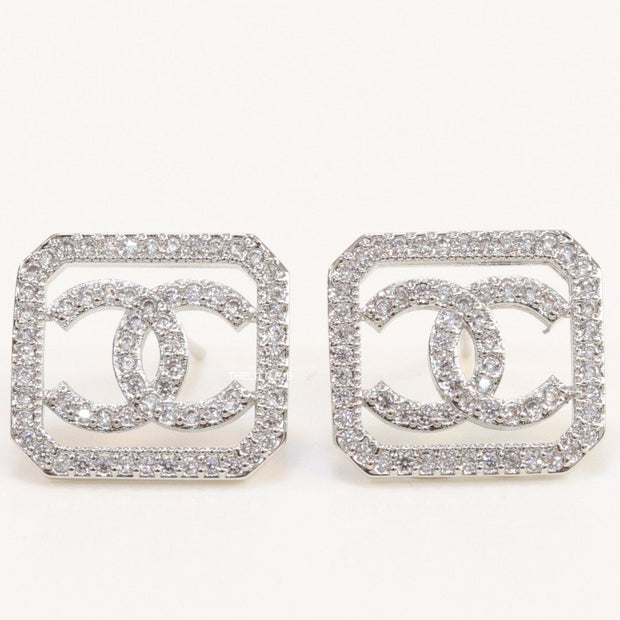 Platinum plated square cz stud with twin C motif