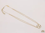 Dual chain golden necklace with alphabet pendant
