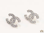 Platinum plated twin C motif studs with fancy cut cz