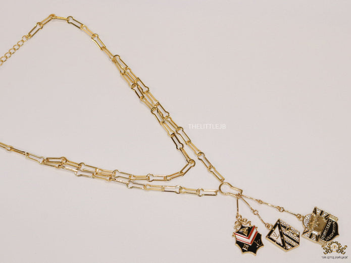 Dual link chain necklace with three in one pendant