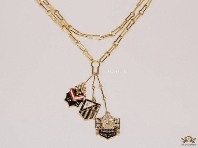 Dual link chain necklace with three in one pendant