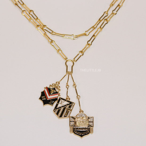 Dual link chain necklace with three in one pendant