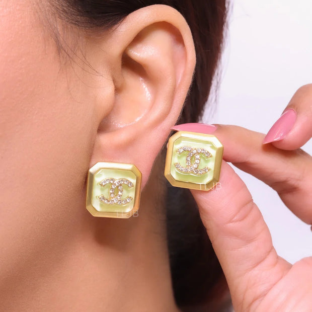 Square green enamel Double C gold earrings