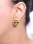 Black and gold double C studs