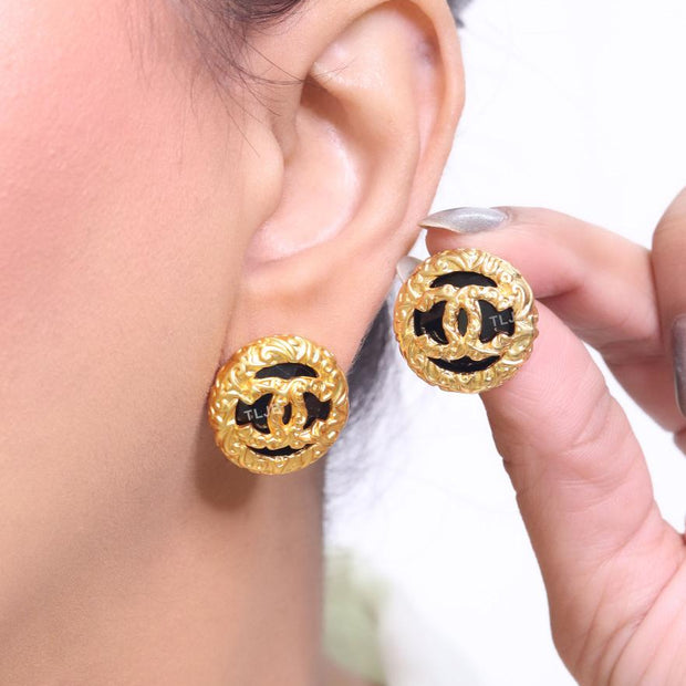 Black and gold double C studs