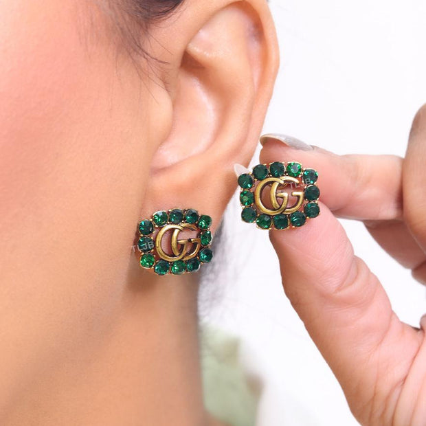 Double G emerald stones studs