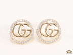 Gold plated round cz earrings with twin G motif
