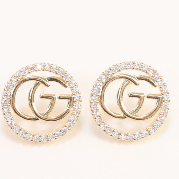 Gold plated round cz earrings with twin G motif