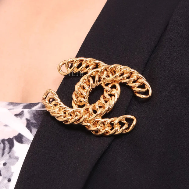 Gold Double C chain brooch