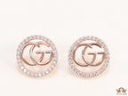Rose gold plated round cz earrings with twin G motif