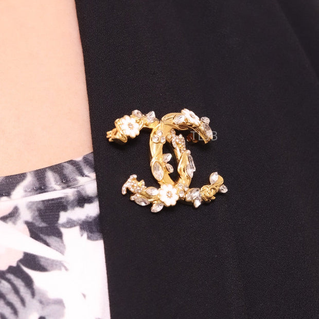Gold Double C brooch with enamel flowers and cz leaves