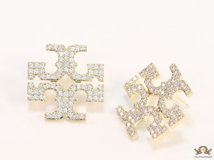 Gold plated twin T motif cz earrings